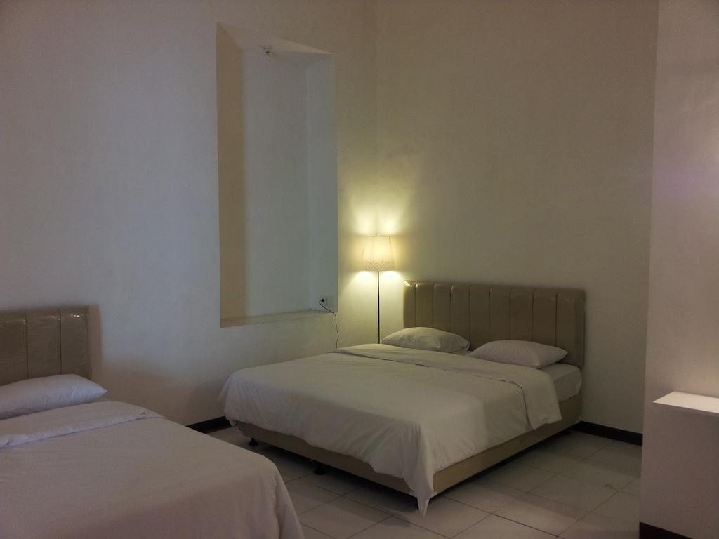 Loxy Inn Surabaya Zimmer foto