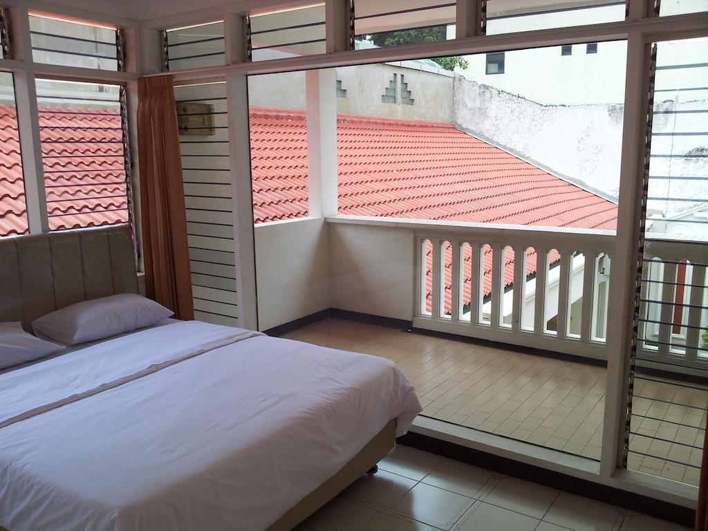 Loxy Inn Surabaya Zimmer foto