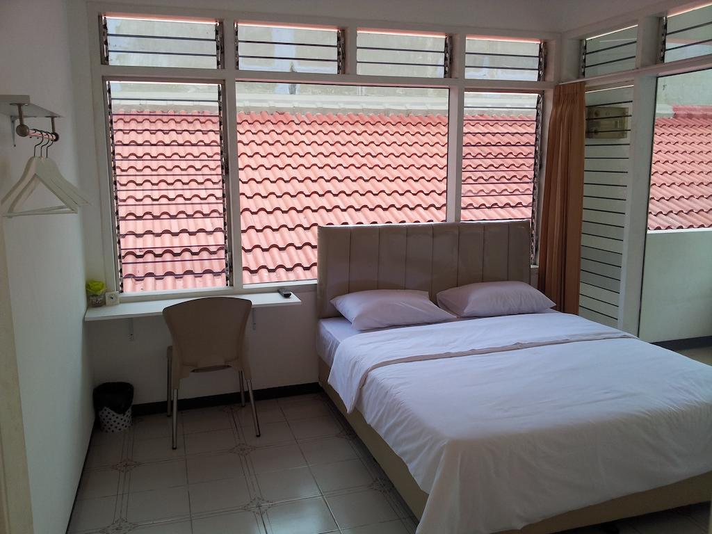 Loxy Inn Surabaya Zimmer foto